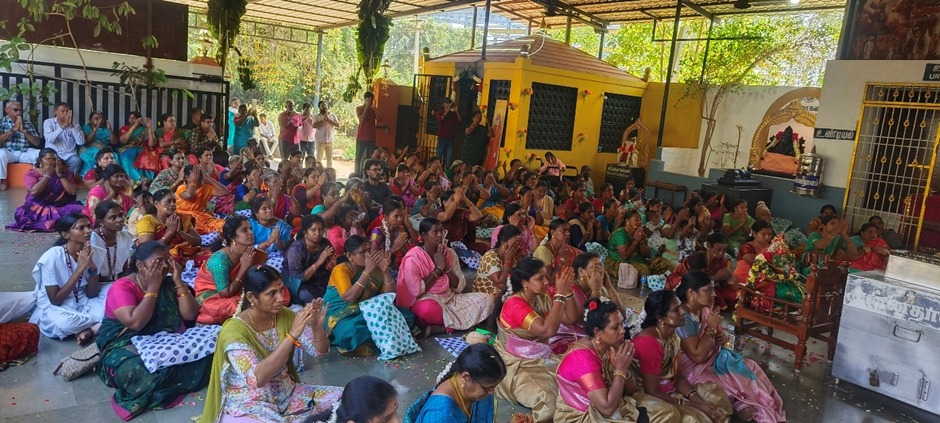 Devotees offering prayers to Sai Baba